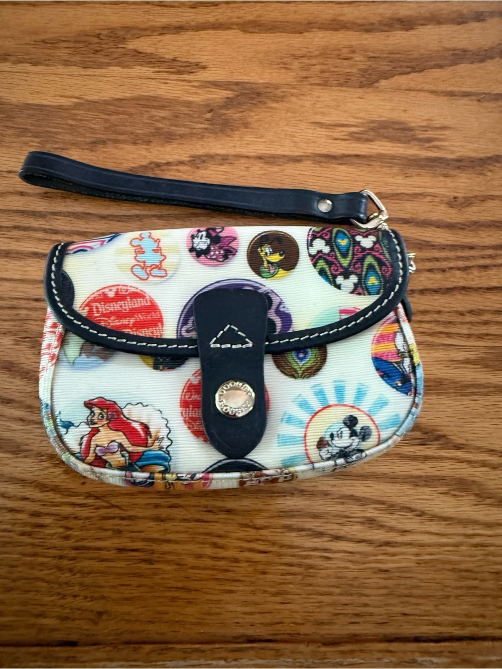 Dooney Boutke Cream Disney Character Wristlet Clutch with Black Trim